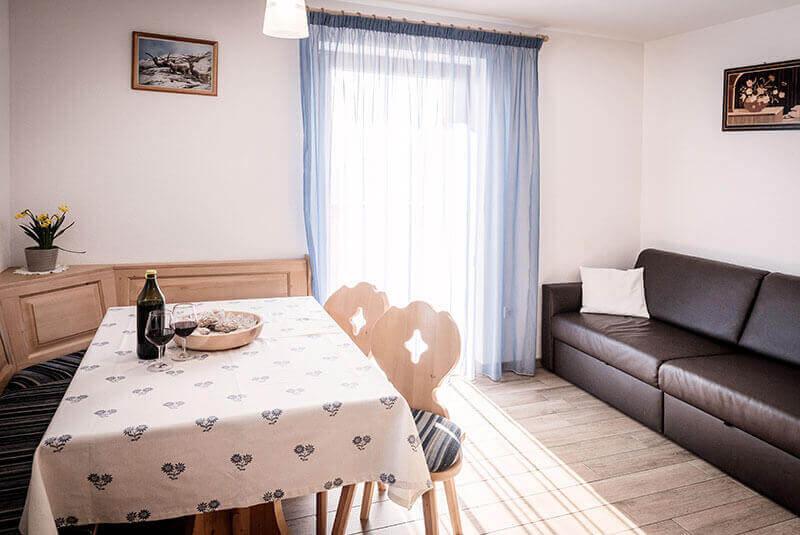 Living and dining area with sofa and dining table - Oberhof Weitental